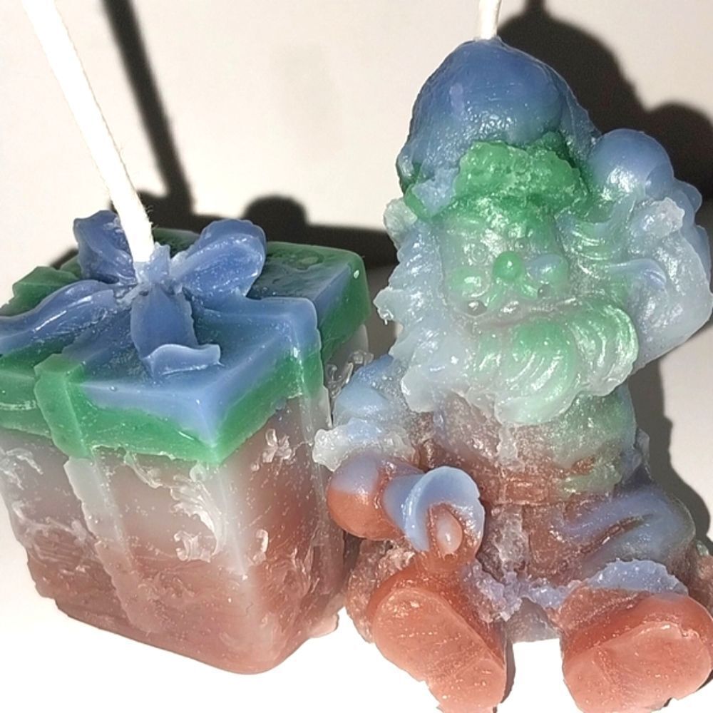 Hand crafted 2 piece holiday Santa's present candle set